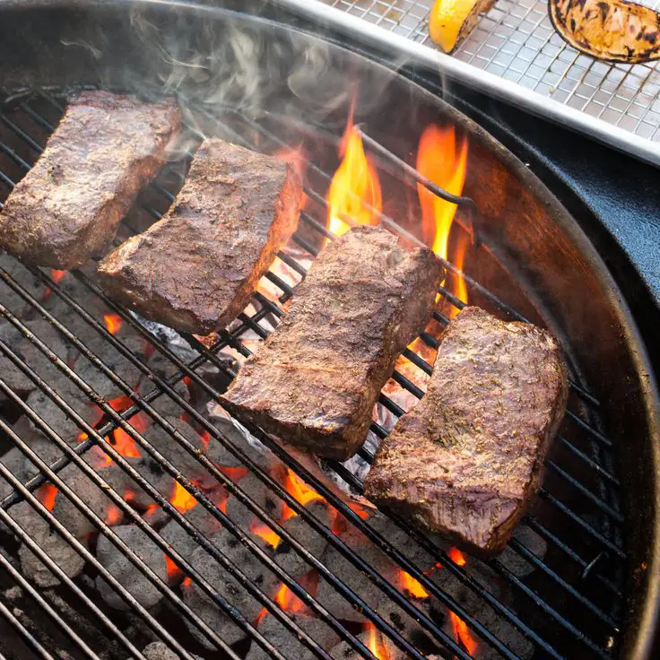 Adding a packet of wood chips to the grill can take an inexpensive ...