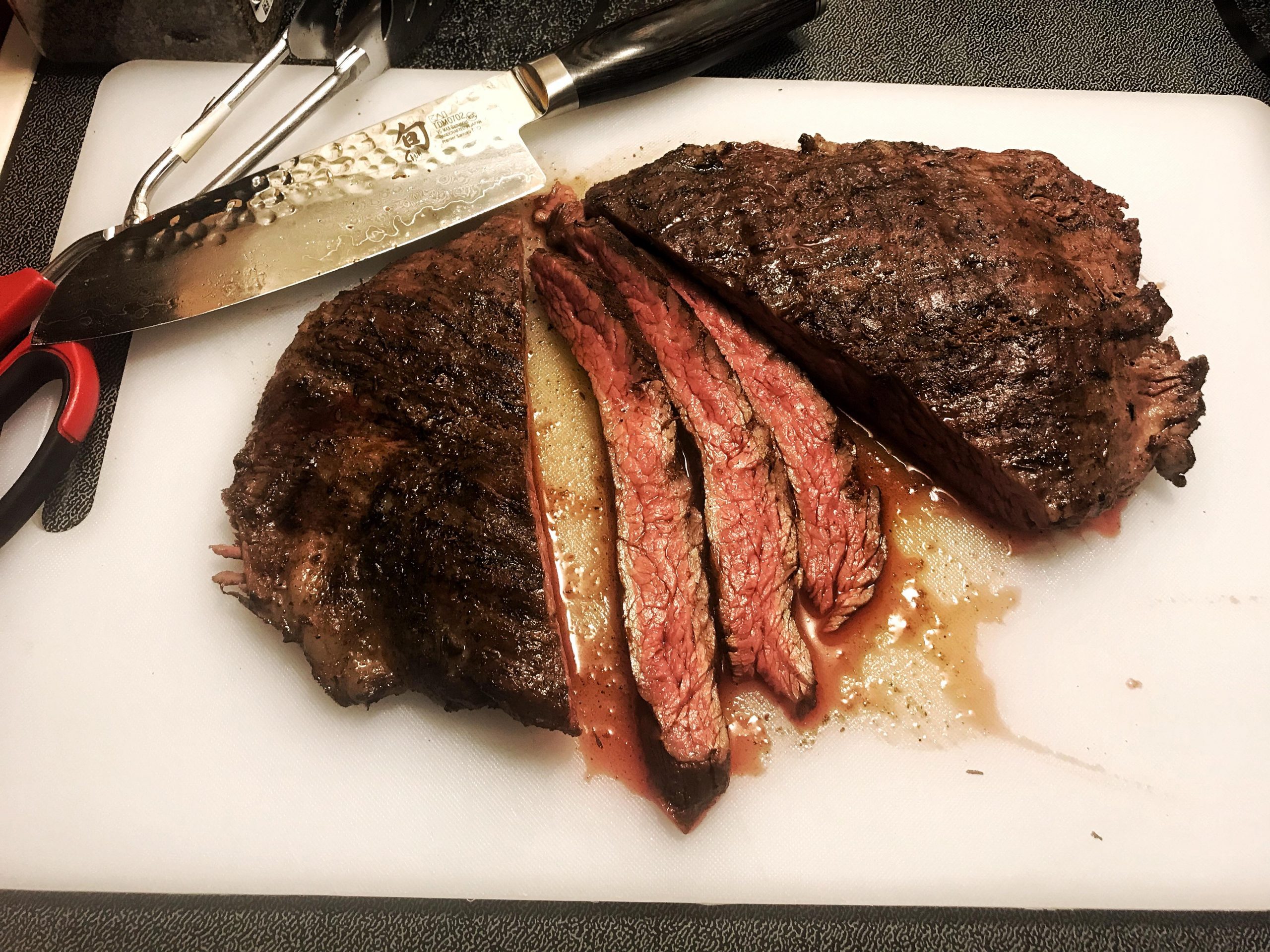 Flank Steak 130 for 2 hours seared over natural charcoal on my Weber ...