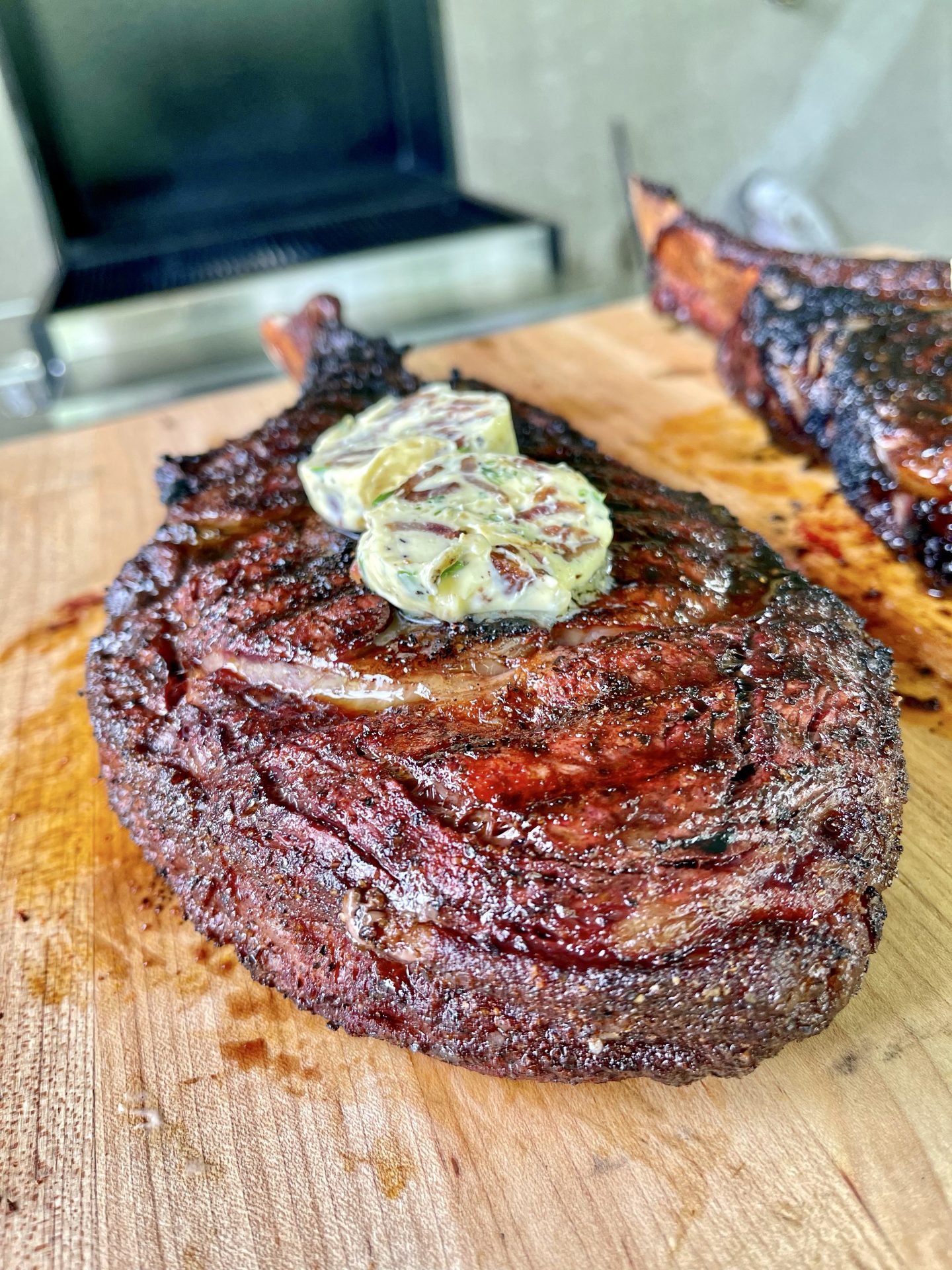 Tomahawk Steaks With a Hickory Bacon Compound Butter